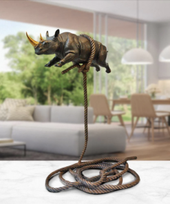 Alternative view of Flying rhino on short rope with a gold horn - Gillie and Marc